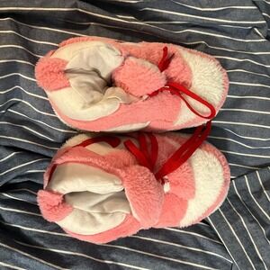 Pink and white Nike Air Jordan slippers